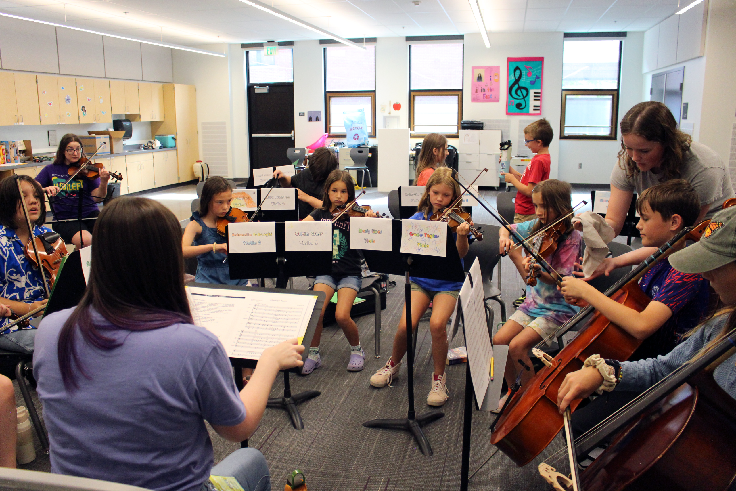 joy-music-teacher-leading-orchestra